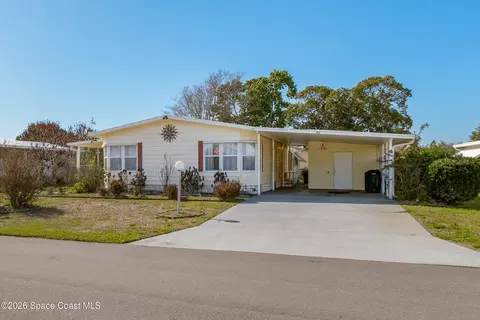 917 Cypress St, Barefoot Bay, FL 32976