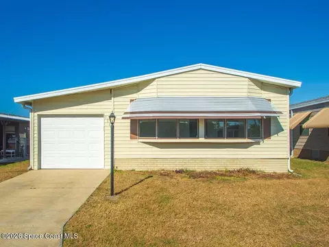 908 Oleander Cir, Barefoot Bay, FL 32976