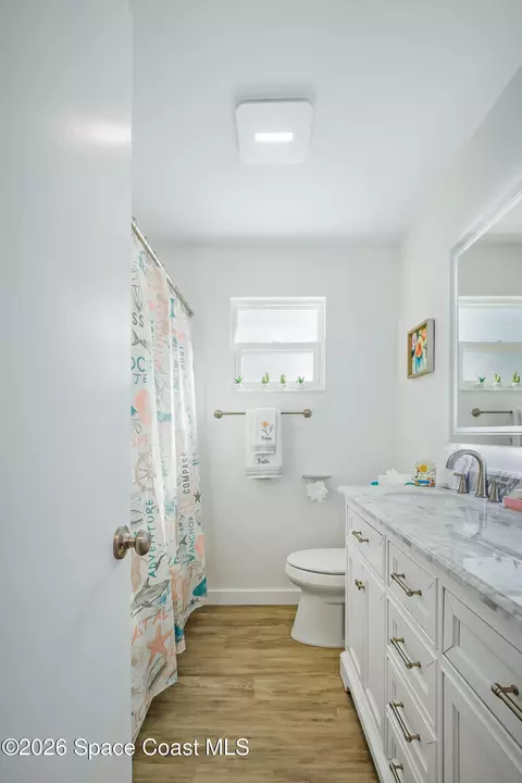 Bath - 557 Ixora Dr, Melbourne, FL 32935 photo 2 of 3