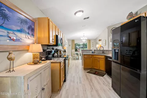 Kitchen - 5061 Spinet Dr, Melbourne, FL 32940 photo 2 of 5