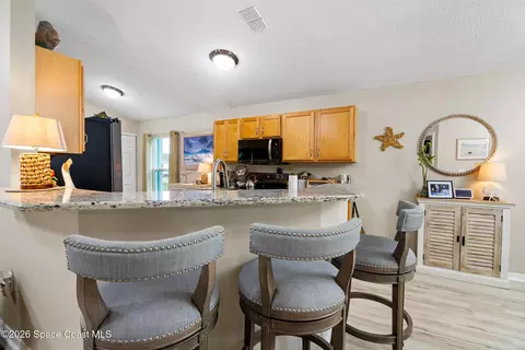 Kitchen - 5061 Spinet Dr, Melbourne, FL 32940 photo 1 of 5