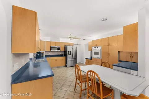 Kitchen - 8637 Sylvan Dr, Melbourne, FL 32904 photo 4 of 5
