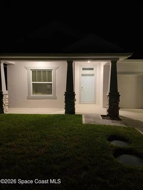 Exterior - 8231 Laguna Cir, Micco, FL 32976 photo 7 of 9