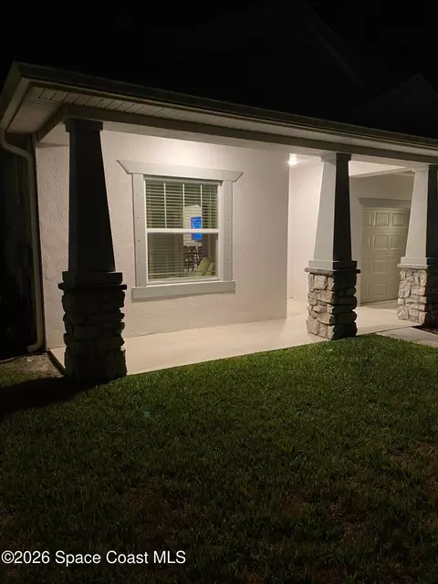 Exterior - 8231 Laguna Cir, Micco, FL 32976 photo 2 of 9