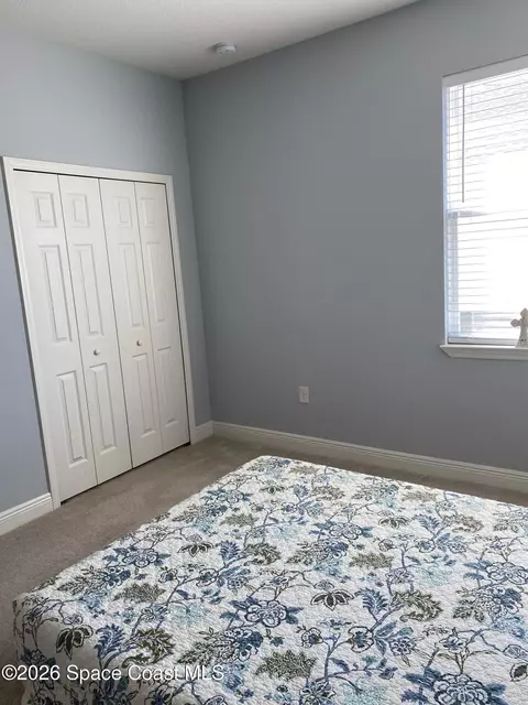 Bedroom - 8231 Laguna Cir, Micco, FL 32976 photo 6 of 9