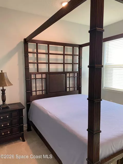 Bedroom - 8231 Laguna Cir, Micco, FL 32976 photo 7 of 9