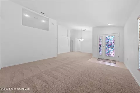 Living - 3567 Hoofprint Dr, Melbourne, FL 32940 photo 2 of 5