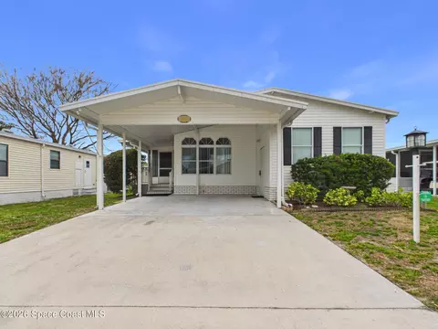 573 Dolphin Cir, Barefoot Bay, FL 32976