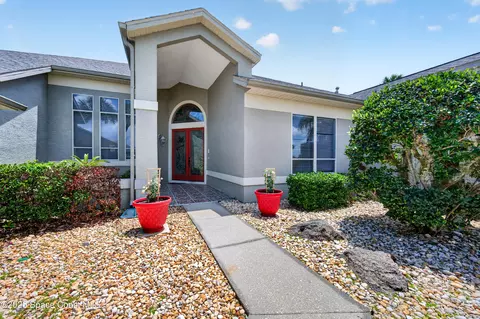 Exterior - 900 Bluegrass Ln, Rockledge, FL 32955 photo 2 of 13