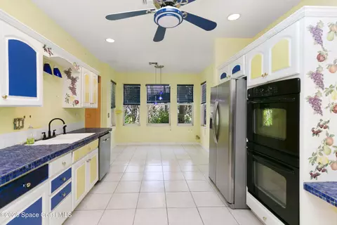 Kitchen - 3535 Sparrow Hawk Trl, Mims, FL 32754 photo 4 of 4