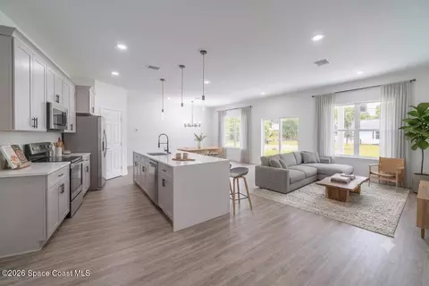 Living - 983 Pace Dr NW, Palm Bay, FL 32907 photo 2 of 8
