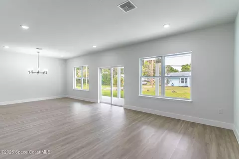 Living - 983 Pace Dr NW, Palm Bay, FL 32907 photo 4 of 8