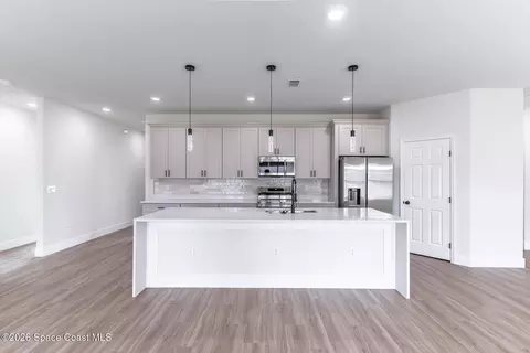Kitchen - 983 Pace Dr NW, Palm Bay, FL 32907 photo 3 of 4