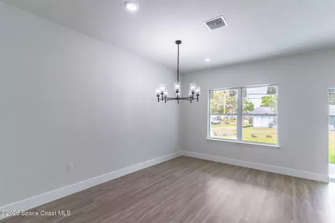 Living - 983 Pace Dr NW, Palm Bay, FL 32907 photo 6 of 8