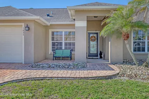 Exterior - 1432 Old Millpond Rd, Melbourne, FL 32940 photo 2 of 14