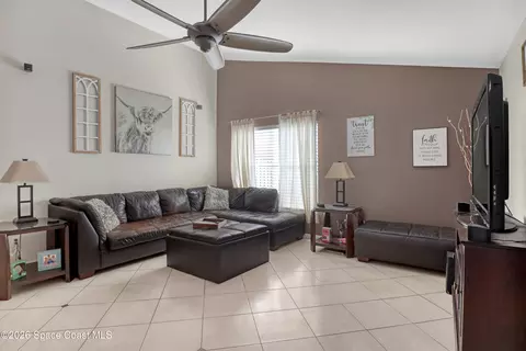 Living - 1432 Old Millpond Rd, Melbourne, FL 32940 photo 1 of 2
