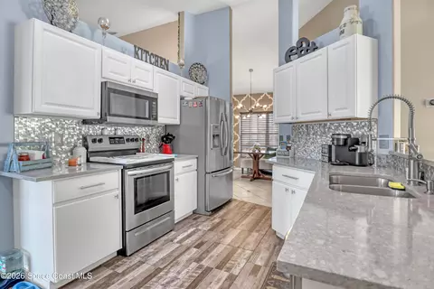Kitchen - 1432 Old Millpond Rd, Melbourne, FL 32940 photo 2 of 5