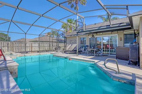 Exterior - 1432 Old Millpond Rd, Melbourne, FL 32940 photo 7 of 14