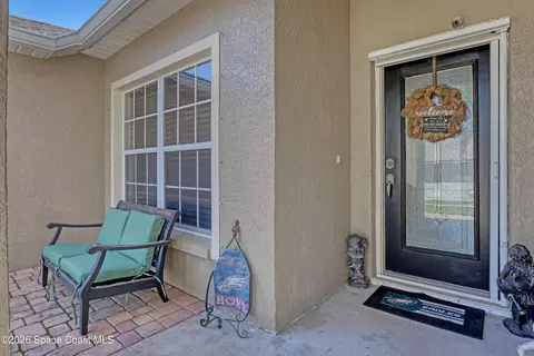Exterior - 1432 Old Millpond Rd, Melbourne, FL 32940 photo 3 of 14
