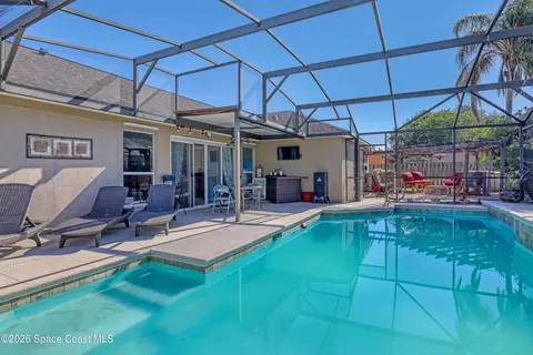 Exterior - 1432 Old Millpond Rd, Melbourne, FL 32940 photo 11 of 14