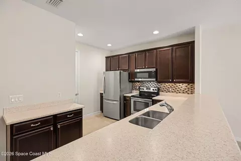 Kitchen - 5748 Tamarac Dr, Melbourne, FL 32940 photo 3 of 3