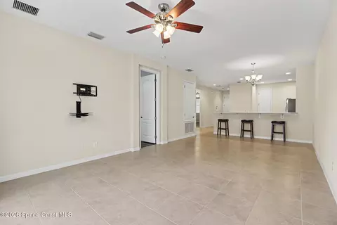 Living - 5748 Tamarac Dr, Melbourne, FL 32940 photo 2 of 5