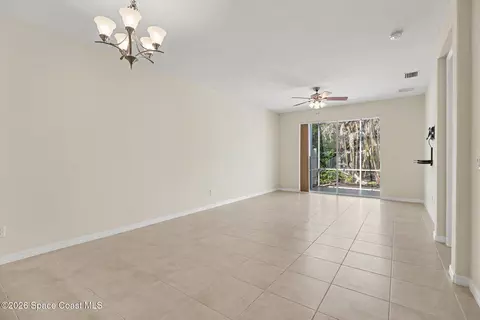 Living - 5748 Tamarac Dr, Melbourne, FL 32940 photo 3 of 5