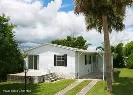 818 Thrush Cir, Barefoot Bay, FL 32976