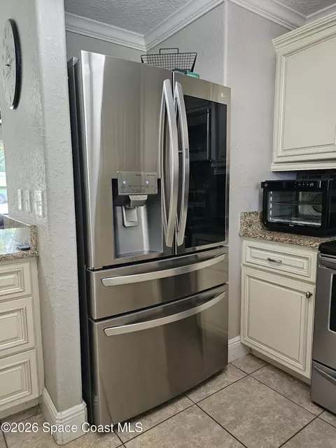 Kitchen - 1925 Bradway St NE, Palm Bay, FL 32905 photo 3 of 7