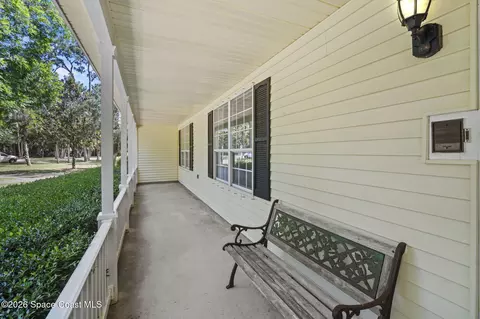 Exterior - 945 Bluegrass Ln, Rockledge, FL 32955 photo 4 of 9