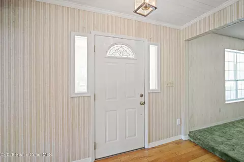 Entry Way - 945 Bluegrass Ln, Rockledge, FL 32955 photo 1 of 2