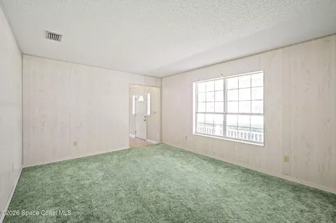 Living - 945 Bluegrass Ln, Rockledge, FL 32955 photo 2 of 6