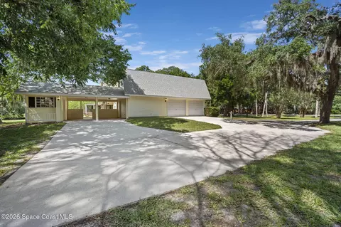 Exterior - 945 Bluegrass Ln, Rockledge, FL 32955 photo 7 of 9