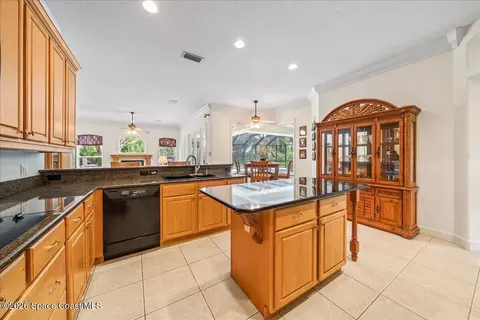 Kitchen - 4389 Ligustrum Dr, Melbourne, FL 32934 photo 2 of 3
