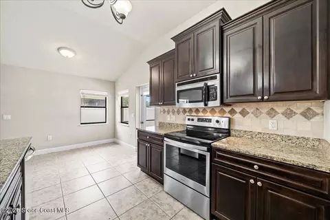 Kitchen - 1461 Bourke Ln, Melbourne, FL 32940 photo 3 of 3