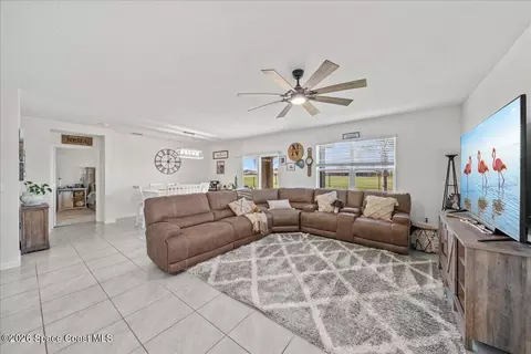 Living - 3250 Burrowing Owl Dr, Mims, FL 32754 photo 1 of 1