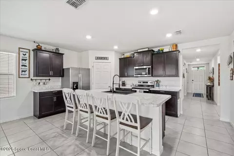 Kitchen - 3250 Burrowing Owl Dr, Mims, FL 32754 photo 2 of 3