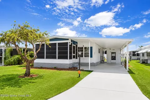 1005 Thrush Cir, Barefoot Bay, FL 32976