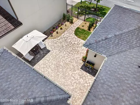 Exterior - 7155 Pena Ln, Melbourne, FL 32940 photo 6 of 10