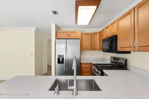 Kitchen - 111 Plover Ln #3-35, Rockledge, FL 32955 photo 2 of 2