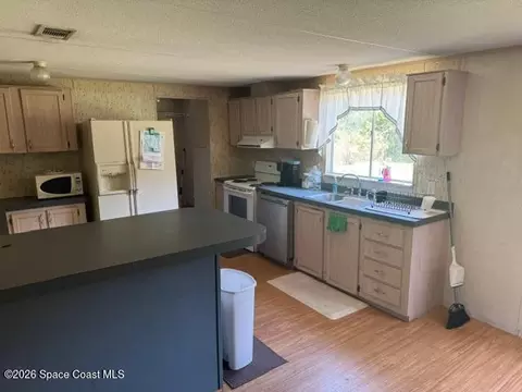 Kitchen - 900 Camp Rd, Cocoa, FL 32927 photo 1 of 2