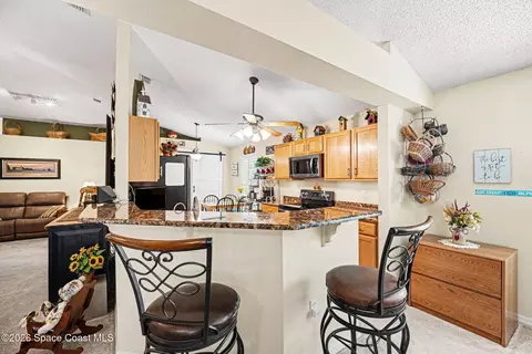 Kitchen - 4670 Blackmore Ct, Melbourne, FL 32934 photo 2 of 3