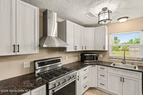Kitchen - 956 Beechfern Ln, Rockledge, FL 32955 photo 3 of 3