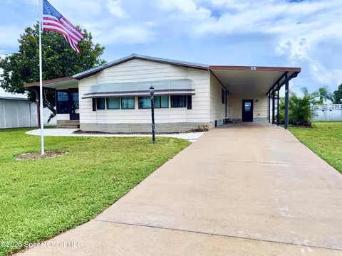 806 Draco Dr, Barefoot Bay, FL 32976