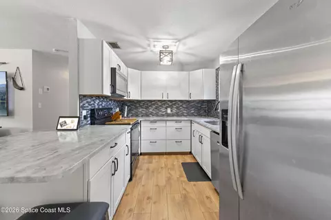 Kitchen - 2361 Pawnee Dr, Melbourne, FL 32935 photo 1 of 3