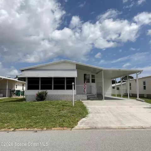334 Macadamia Dr, Barefoot Bay, FL 32976