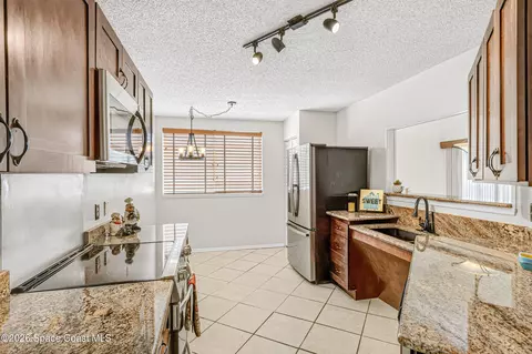Kitchen - 718 Pine Island Dr, Melbourne, FL 32940 photo 2 of 5