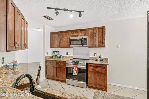 Kitchen - 718 Pine Island Dr, Melbourne, FL 32940 photo 3 of 5