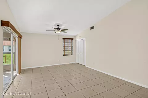 Living - 718 Pine Island Dr, Melbourne, FL 32940 photo 6 of 7