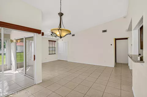 Living - 718 Pine Island Dr, Melbourne, FL 32940 photo 4 of 7